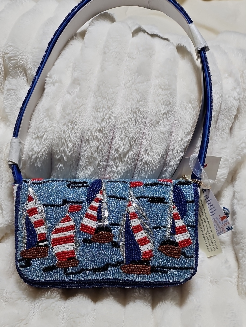 The Viral Beaded Sailboat Motif Bag. Blue And Red.